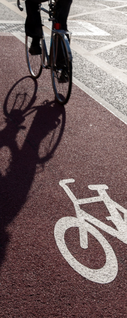 Photograph of a cyclist travelling along a dedicated cycle path