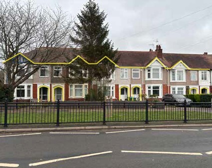A photo of rows of semi-detached housing, some with modifications such as porches, hip to gable extensions etc