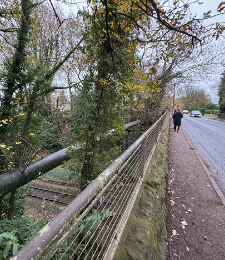 A photo from Stoneleigh Road showing the railway line at a lower level