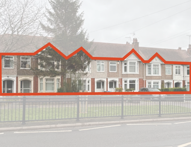 Photo showing red brick terraced houses.