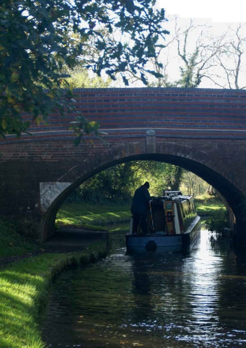 canal image - bridge and boat